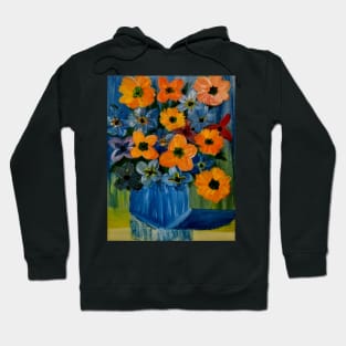 A beautiful bouquet of mixed flowers in a glass and gold vase Hoodie